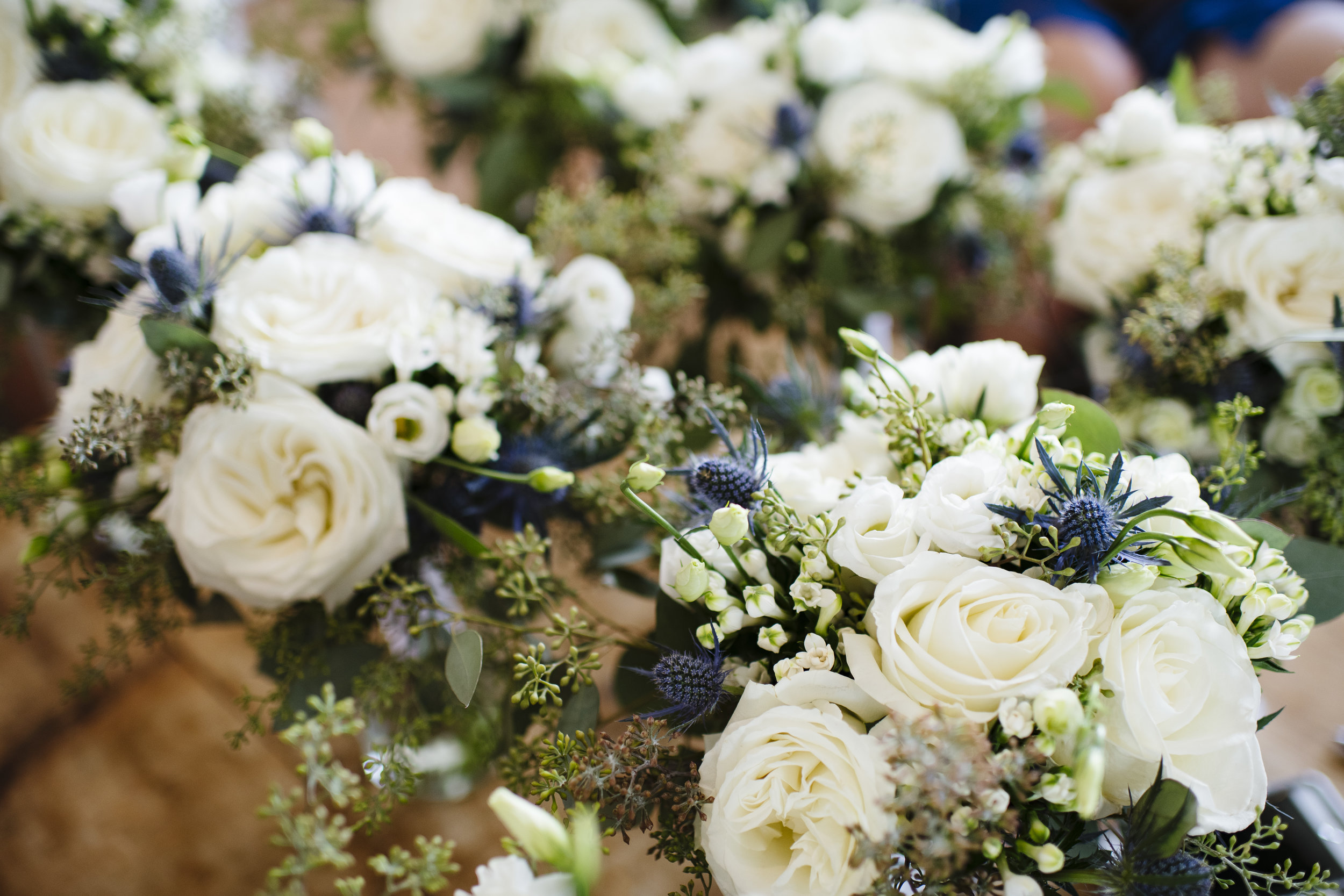 Blue, White and Green bride and bridesmaids bouquets at Jonathan Edwards Winery - Pearl Weddings &amp; Events