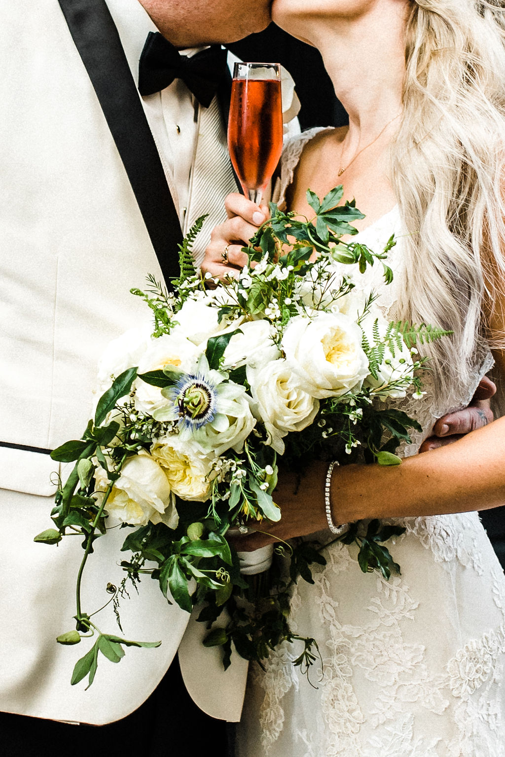 Melanie's passion flower, white rose and greenery bouquet designed by Ruth L. - Pearl Weddings &amp; Events