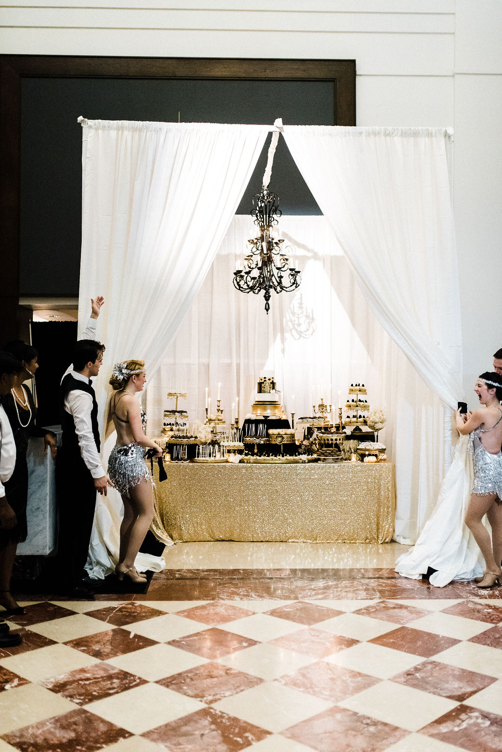 Cake and dessert display at Melanie and Tyler Anderson's great gatsby themed wedding Glen Crytzer's 1940's band for a Great Gatsby themed wedding - Pearl Weddings &amp; Events