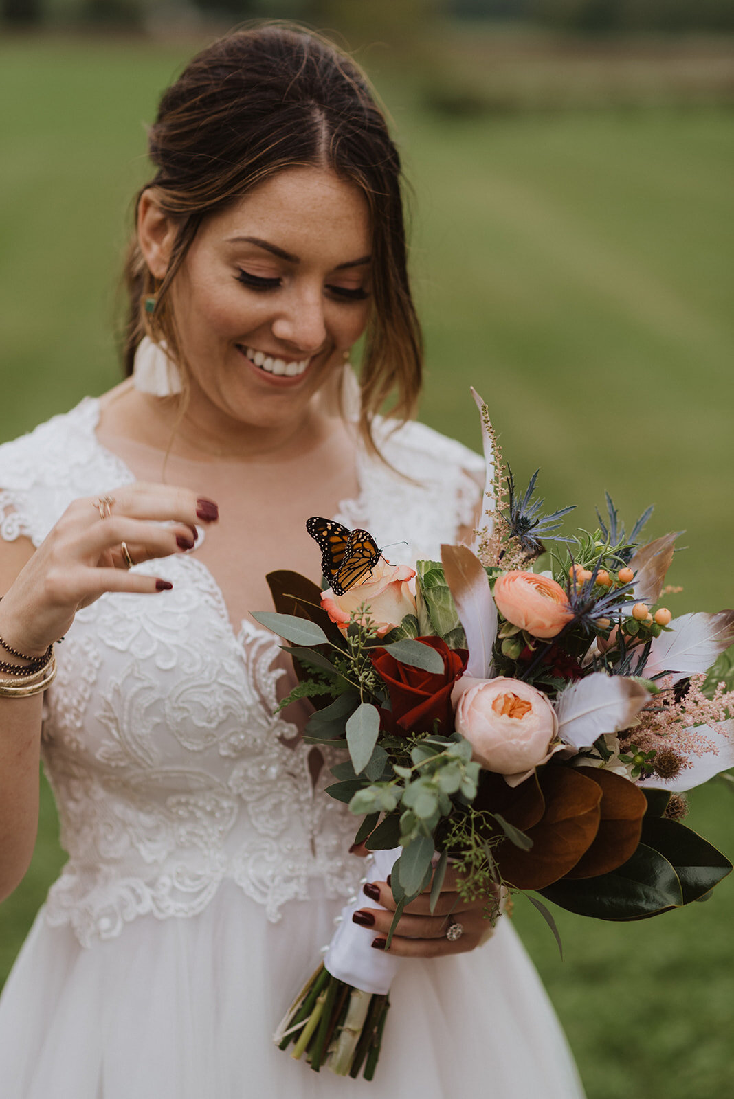 Boho bride with a butterfly at Lion Rock Farm
