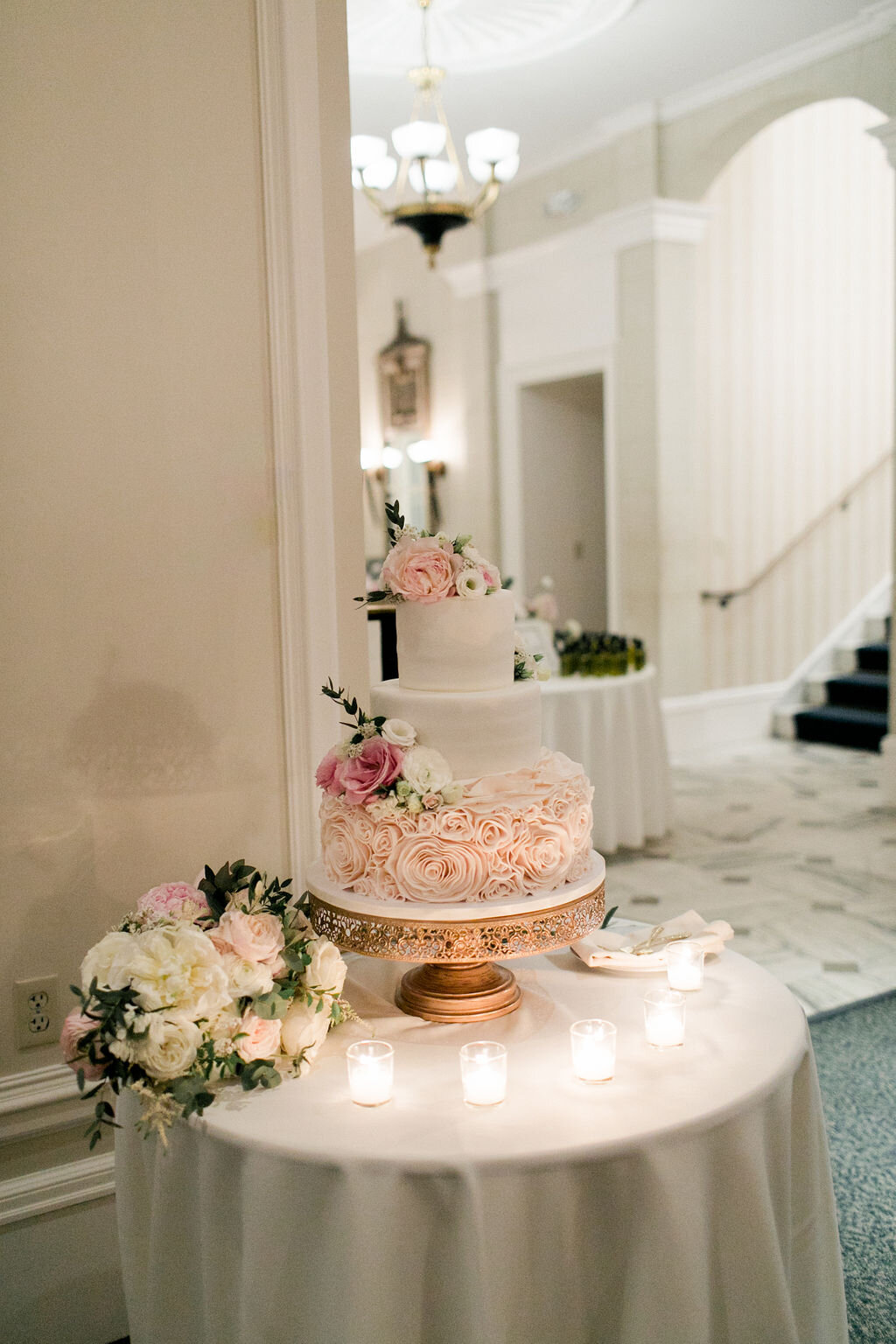 Three tiered white and blush traditional wedding cake - Pearl Weddings &amp; Events