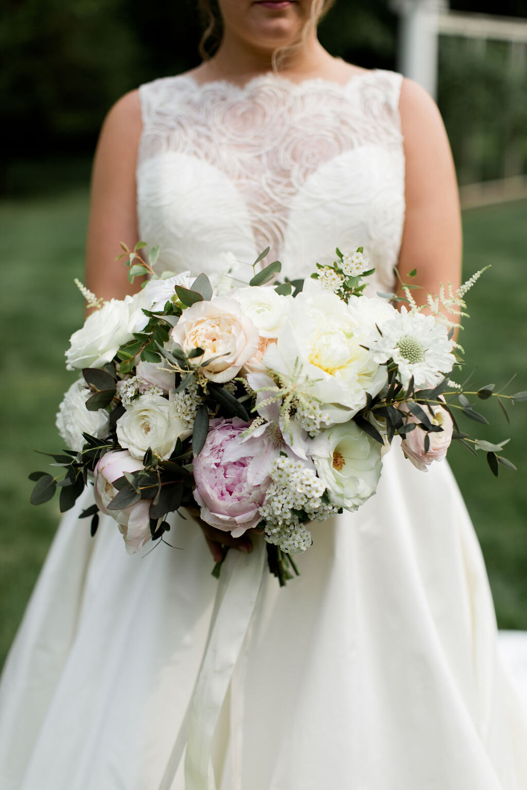 A bride holding a bouquet for her wedding day