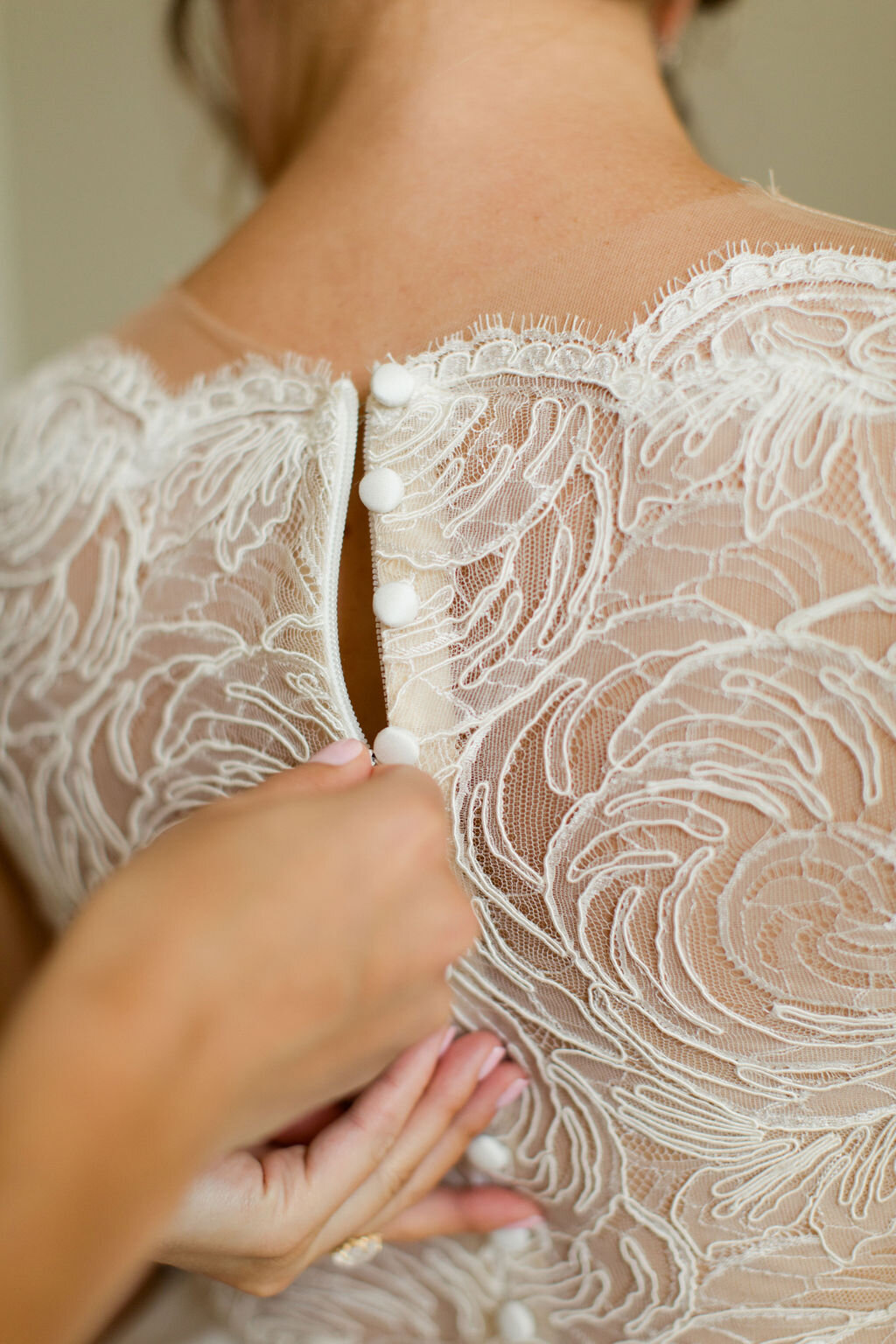 Elegant floral lace details on back of bridal gown - Pearl Weddings &amp; Events