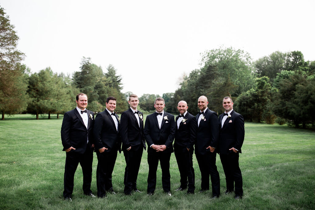 Groomsmen in black bow ties - Pearl Weddings &amp; Events