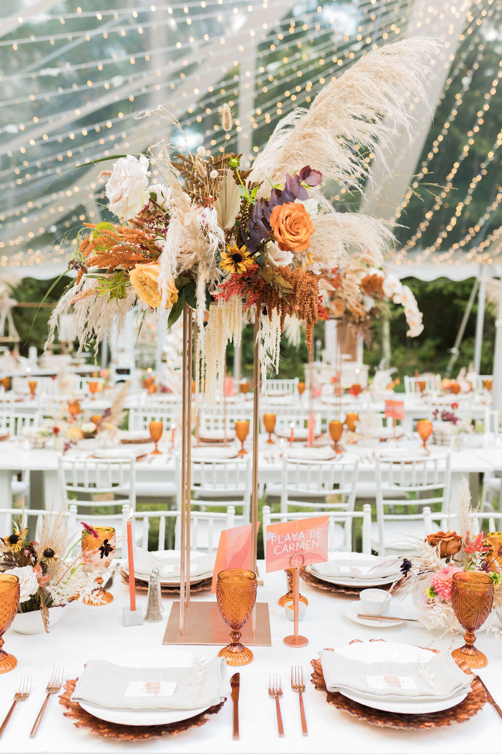 Tall dried flower centerpieces for white farm tables at a sophisticated boho wedding - Pearl Weddings &amp; Events