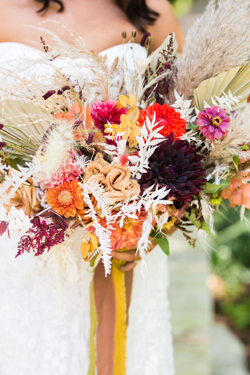 Dried flowers and bright colors in a bridal bouquet - Pearl Weddings &amp; Events
