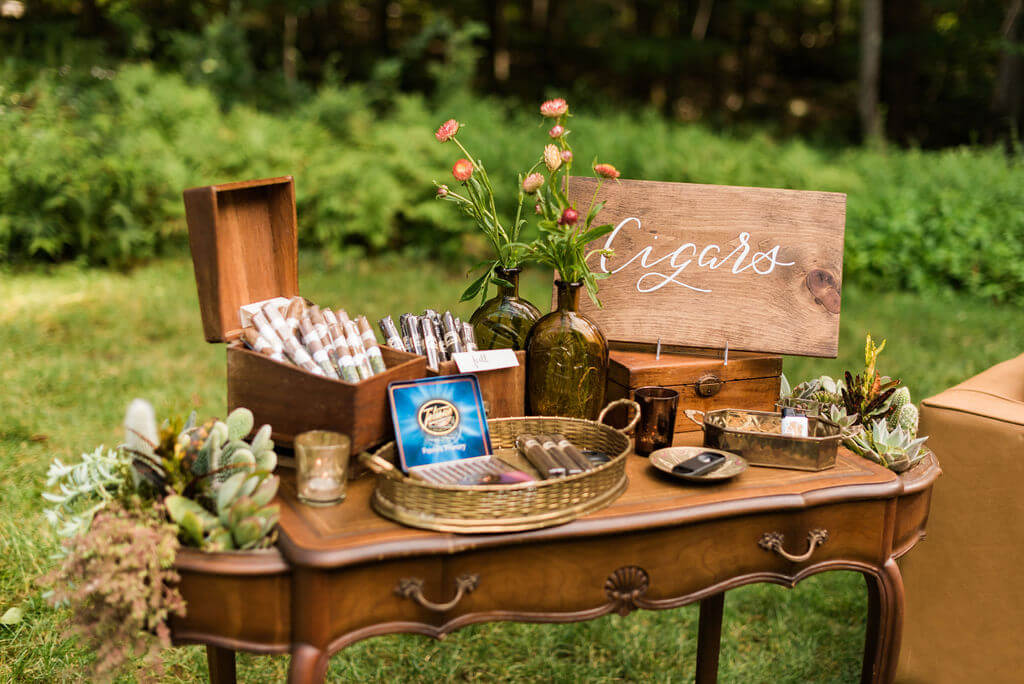 Cigars place of wooden table for guests