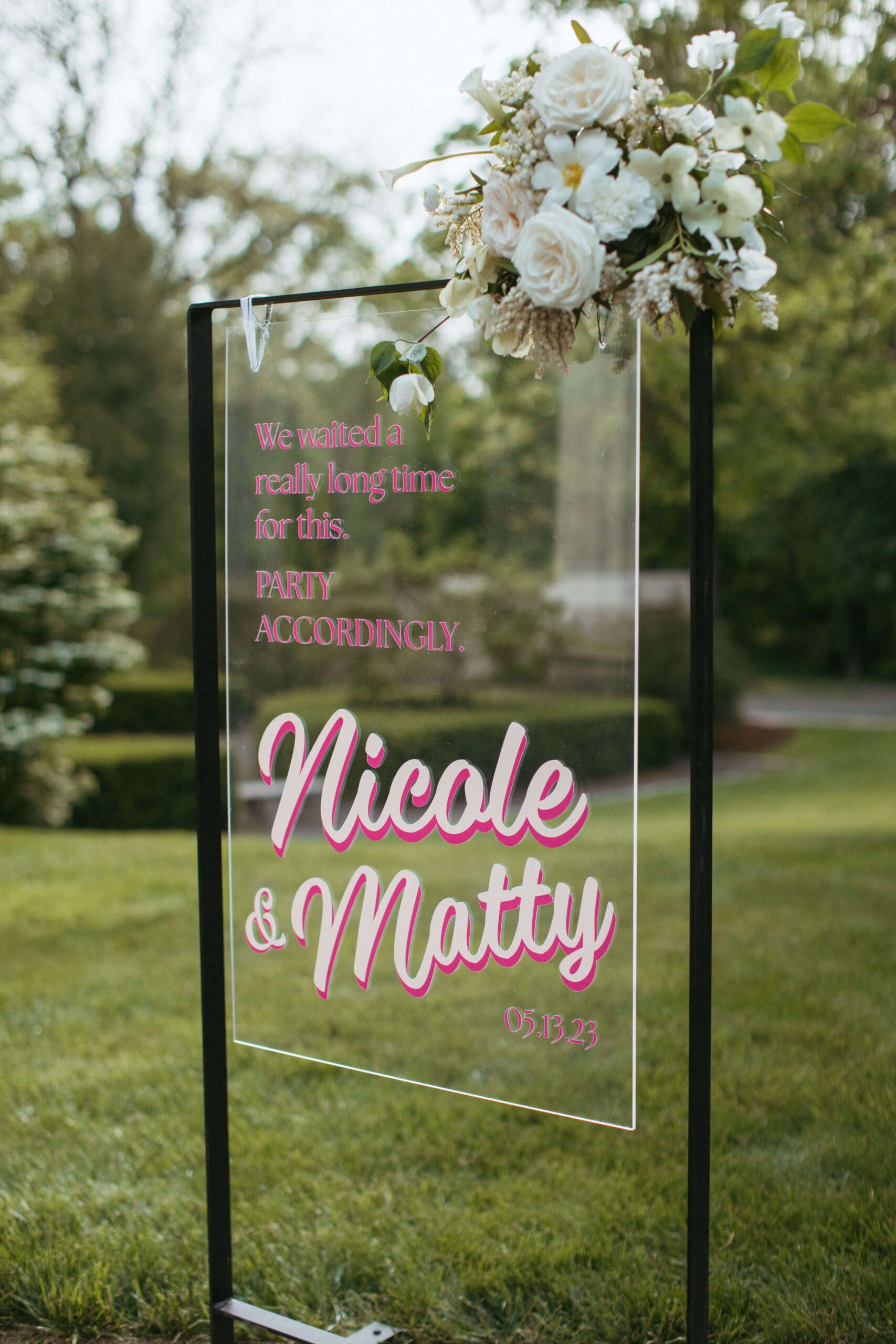 Transparent welcome sign for Matty and Nicole's wedding.