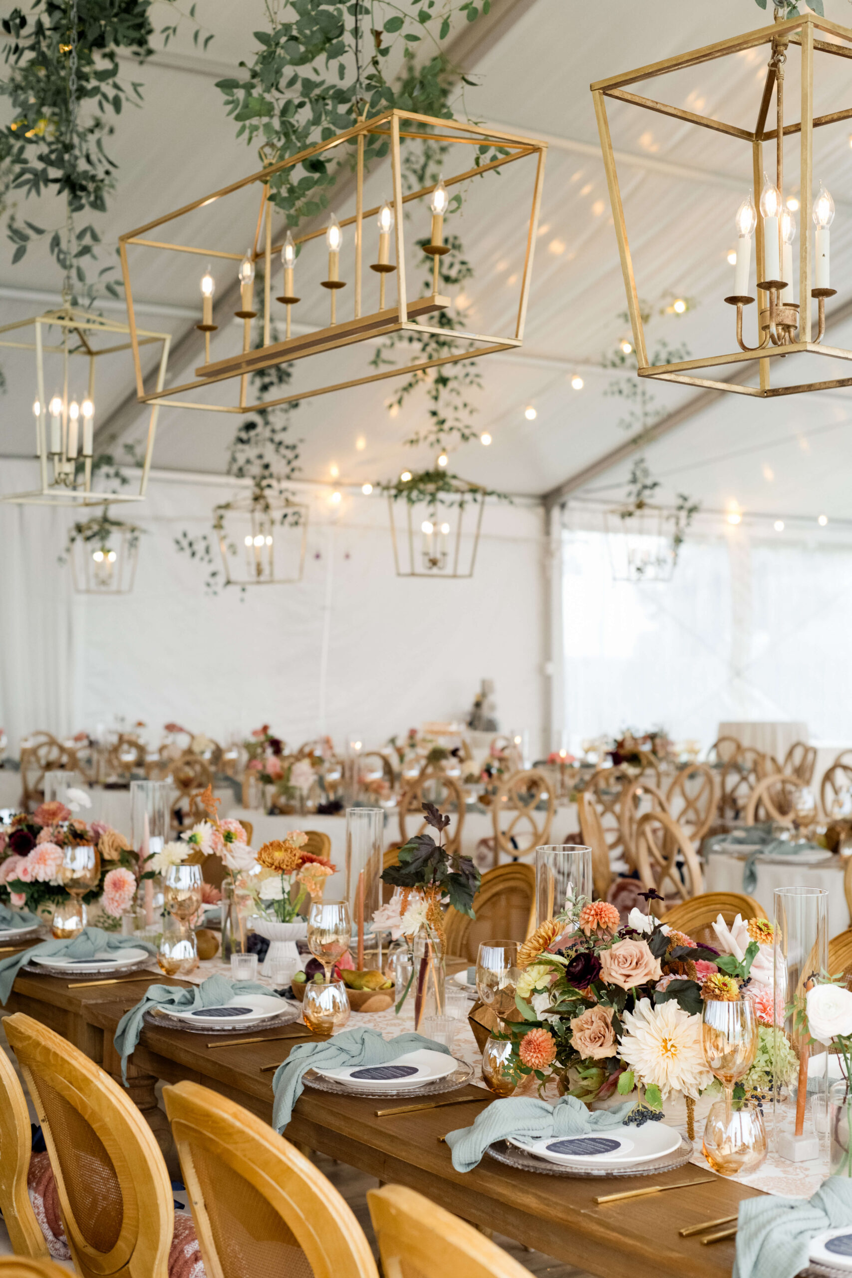 wedding reception for fall wedding with warm toned florals 